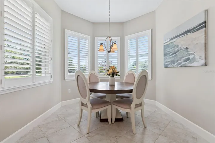 10' x 11' Dinette area w/ Plantation style shutters