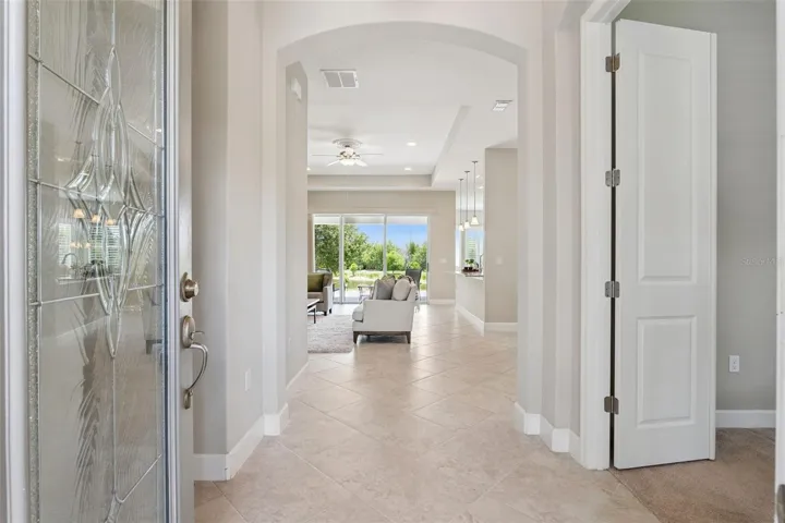 View from Foyer entryway w/ a leaded glass front door