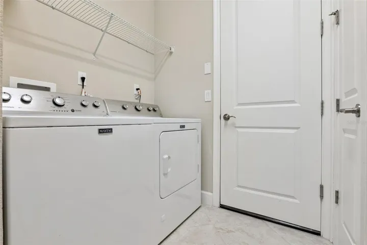 6' x 8'6" Utility Room w/ washer & natural gas dryer
