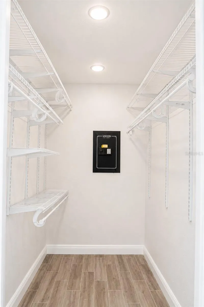 Jack And Jill Closet In Master Bedroom With Built In Safe