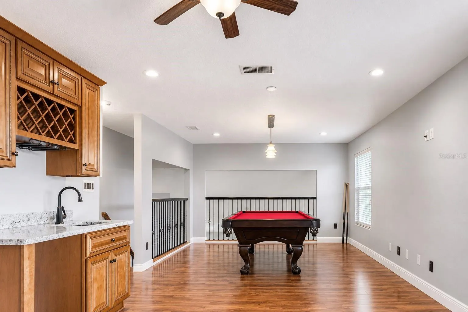 Bonus room with custom Wet Bar Professionally Crafted With Granite Countertops Identical to Kitchen Granite Countertops