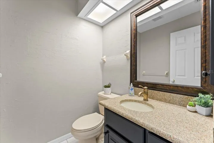 1/2 bath just of 1st bedroom/office