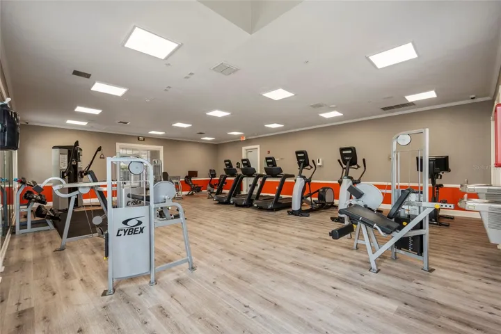 Additional view of fitness center with latest equipment