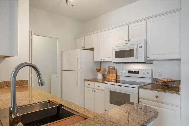 Plenty of countertop space for prep work, all new appliances, new sink, faucet and lighting. Just waiting for the chef to get started.