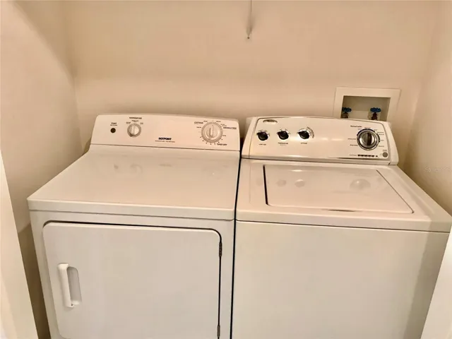 Laundry closet with washer &amp; dryer included.