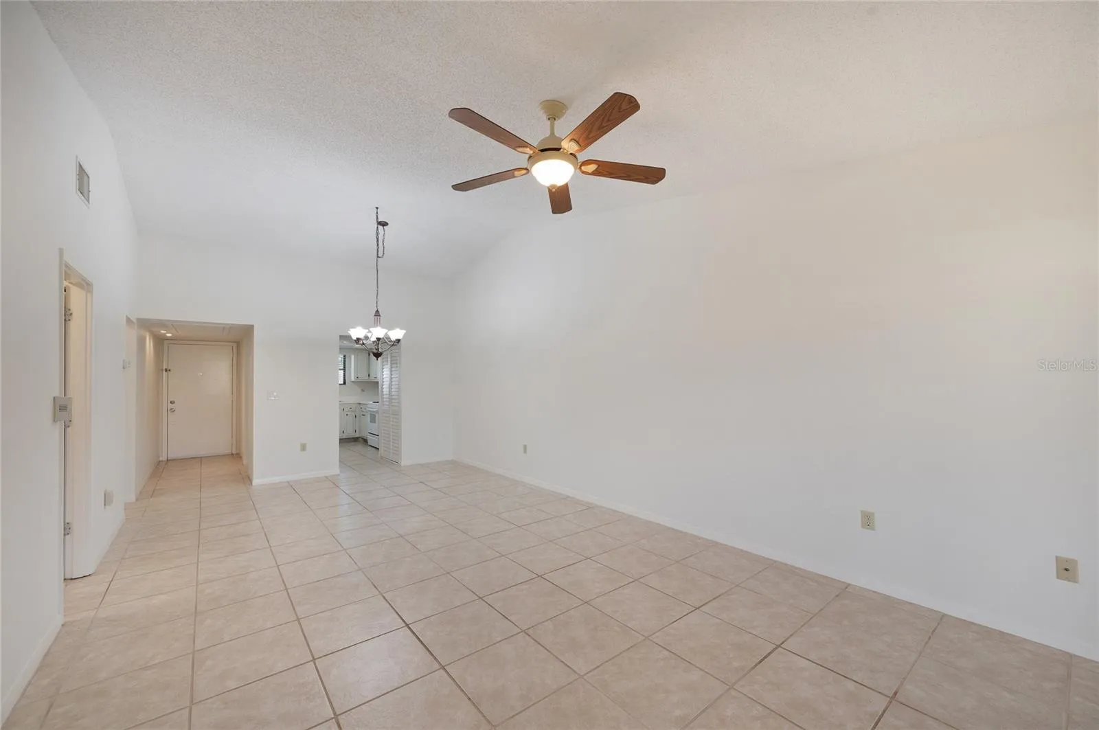 Open floor plan with living room/ Dining room combo and vaulted ceilings