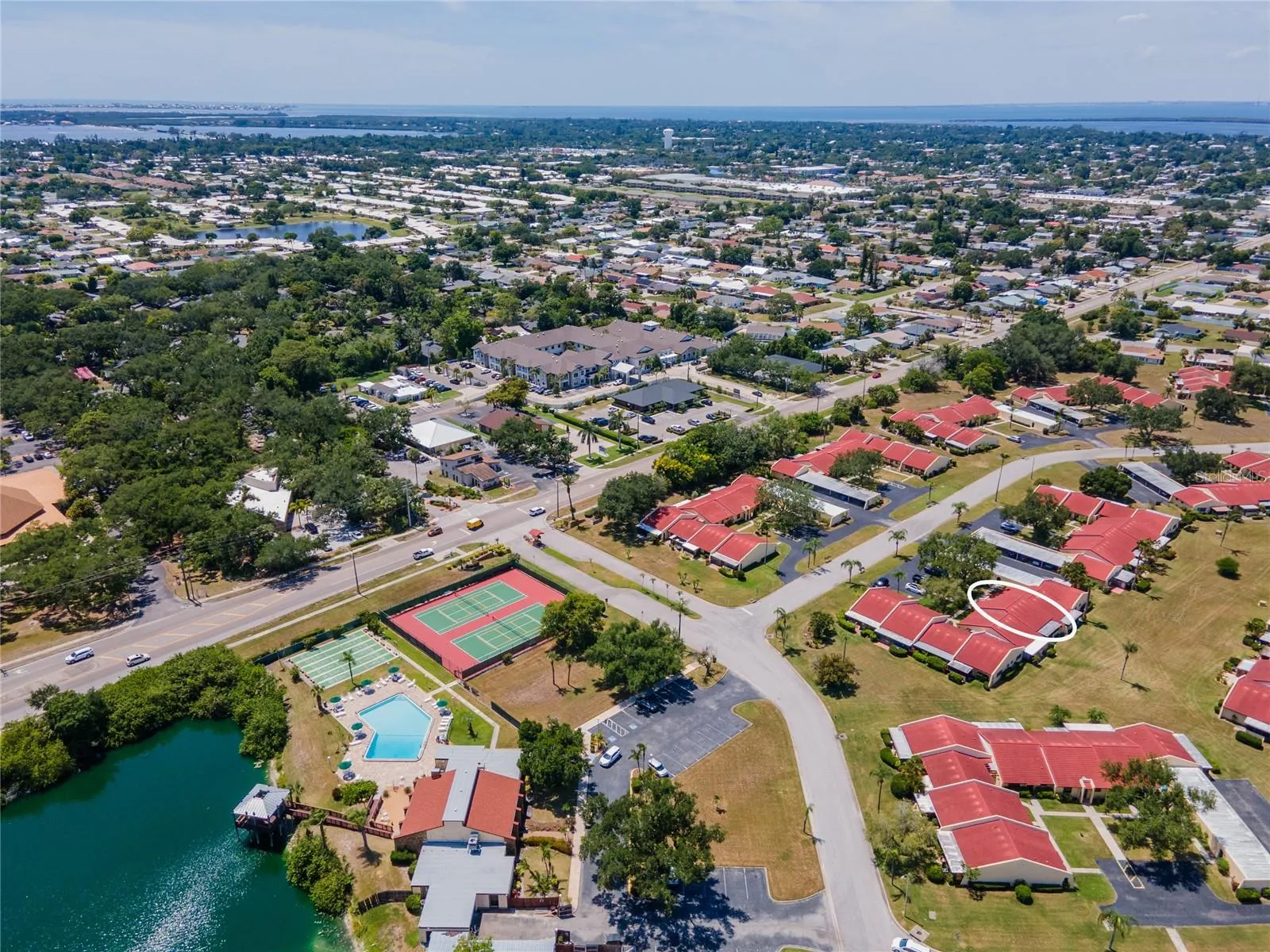 Aerial showing how close Meadowcroft is located to Palma Sola Bay which leads you to Anna Maria Island