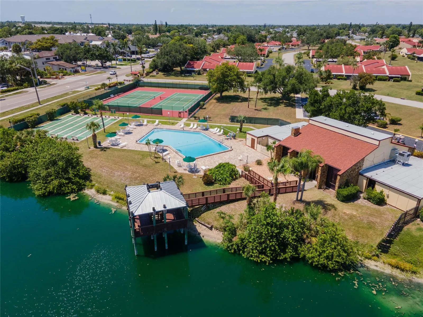 Meadowcroft amenities include a clubhouse, pool, tennis, shuffleboard and fishing pier all conveniently located a short walk from the unit