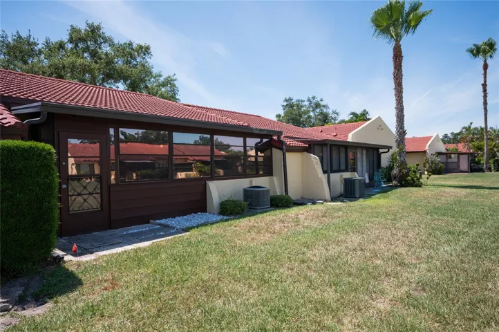 The back of the villa showing the greenspace for enjoying the outdoors