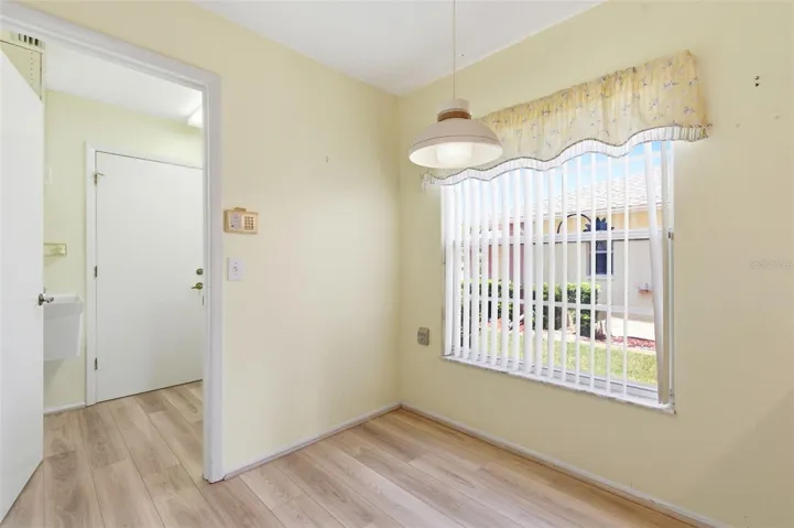 Eat in kitchen area, leading to inside laundry room