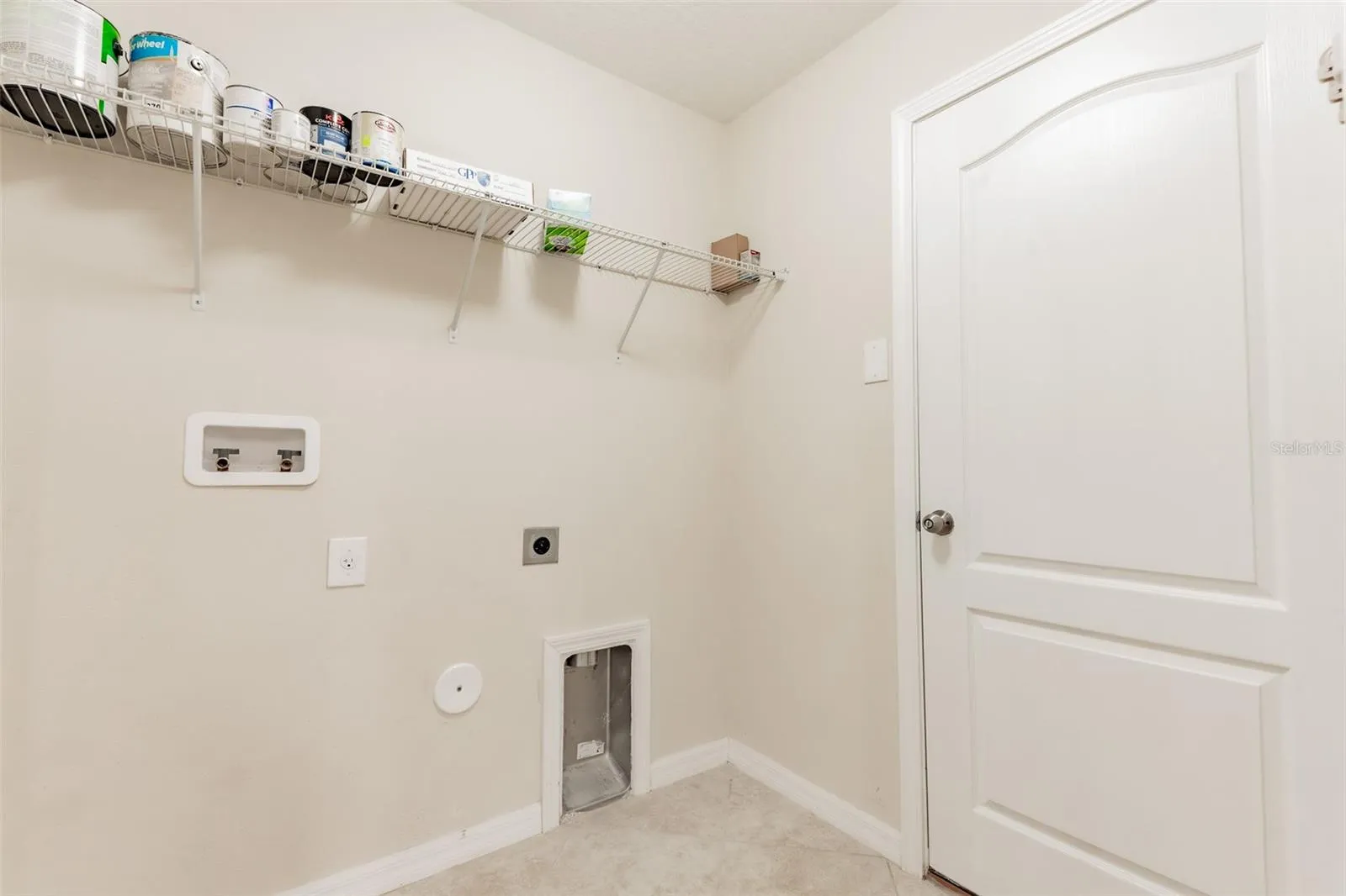 Laundry room to garage door.