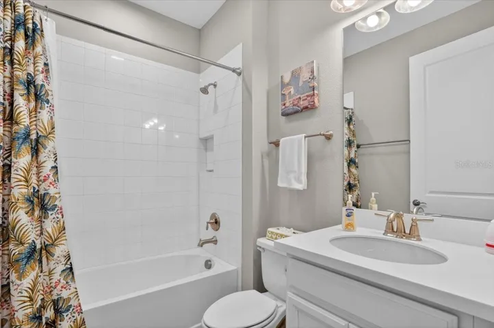Full Bathroom with a tub/shower adjacent to Bedroom 2