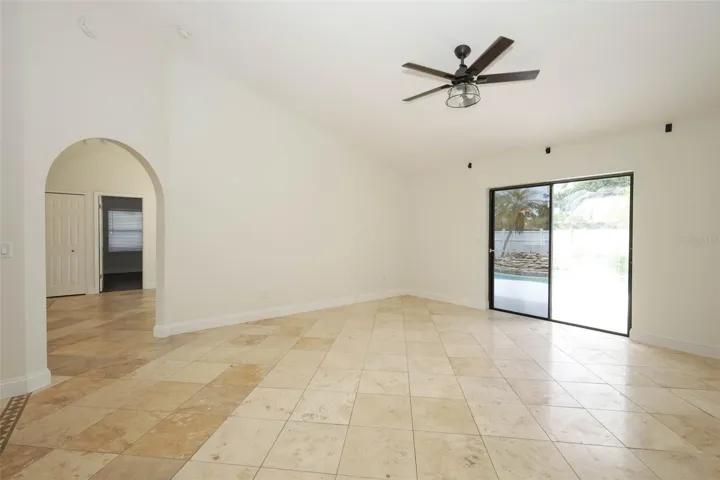 Family room with Travertine tile flooring.