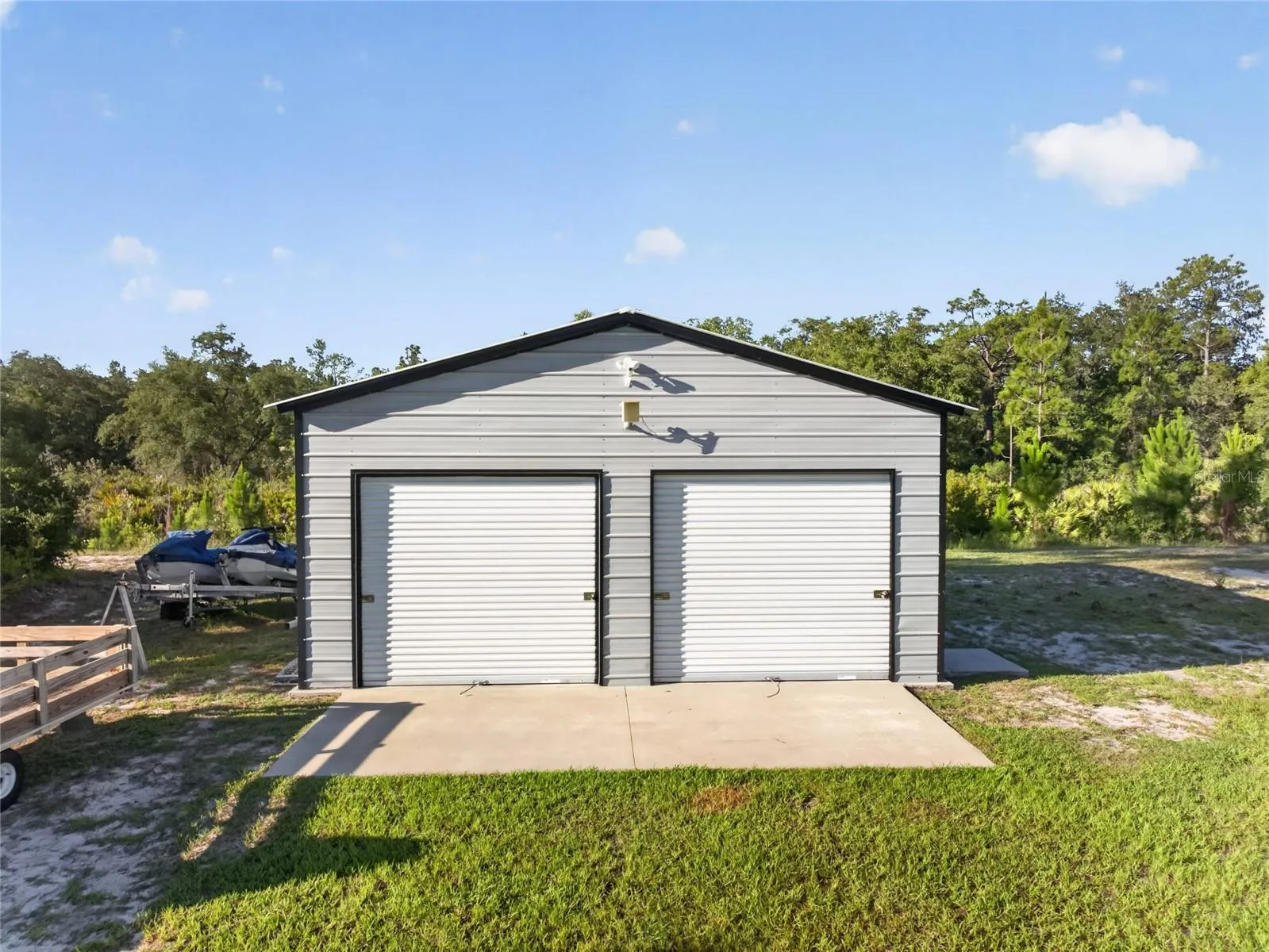 Garage Doors are 8 feet high and 9 feet wide.