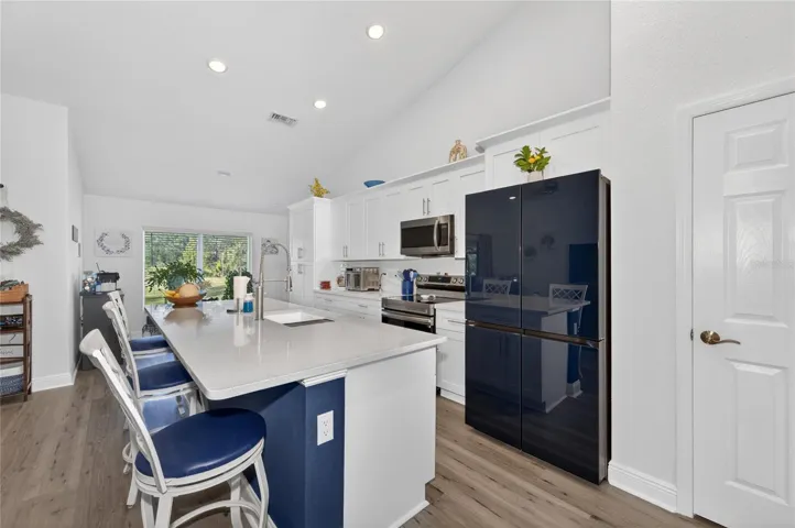 Kitchen (new refrigerator in garage conveys)