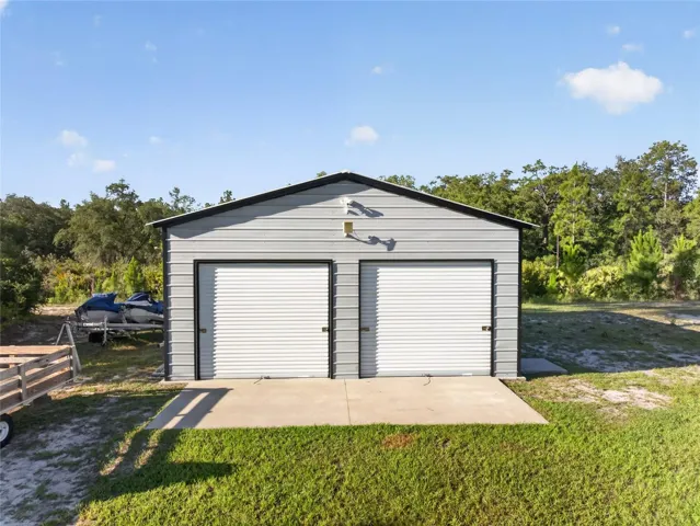 Garage Doors are 8 feet high and 9 feet wide.