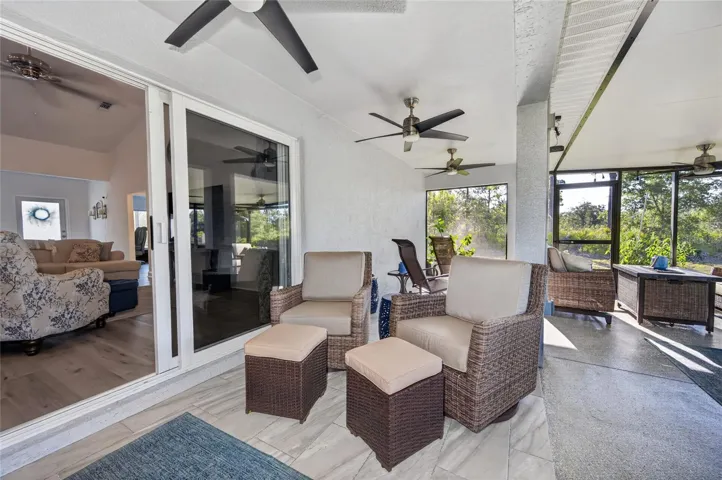 Outdoor living space with mounted TV