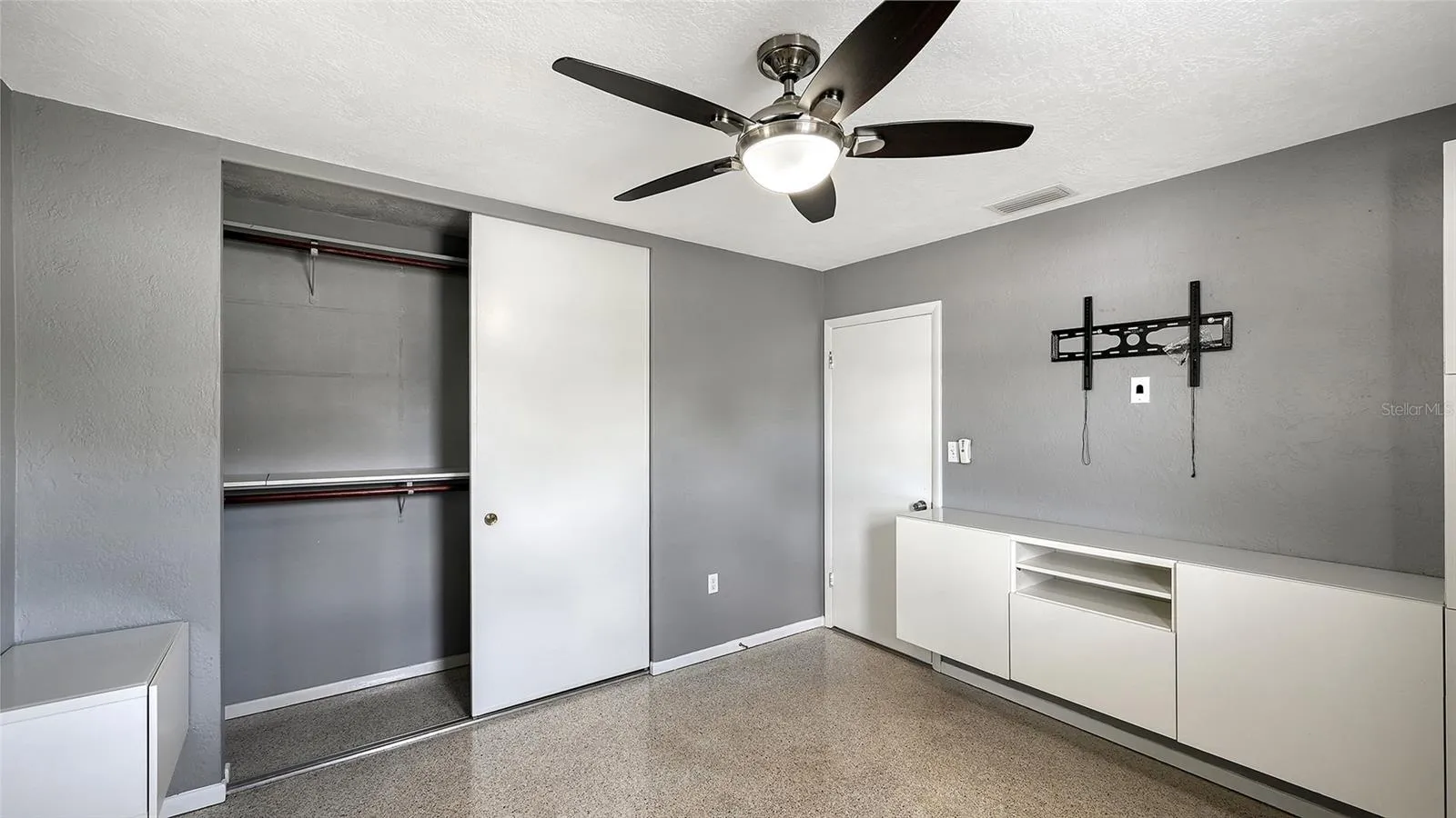 Primary Bedroom with built in cabinets