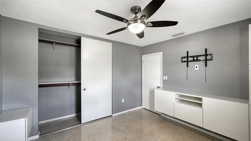 Primary Bedroom with built in cabinets