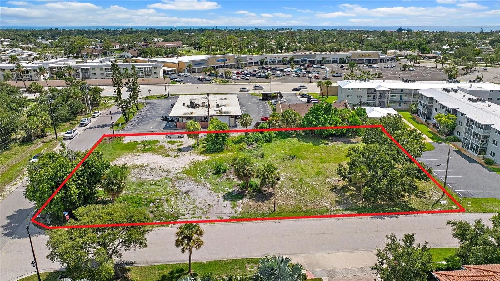 Aerial view of the buildable lot with property boundary lines