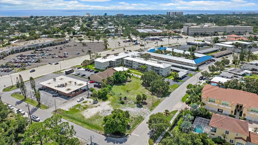 Aerial view of the lot with waterfront high-rises visible in the distance