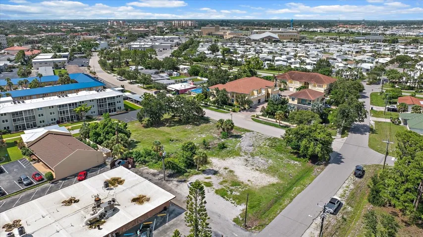 Aerial view of the lot with downtown skyline in the distance