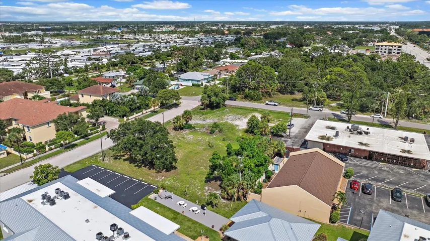 Aerial view of the lot overlooking the surrounding residential neighborhood