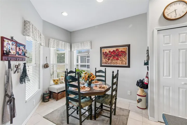 Dinette with three windows looking at conservation area