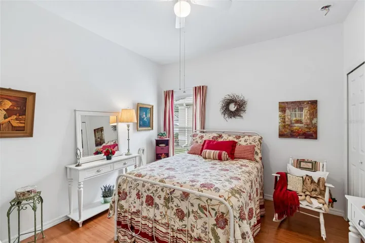 Second bedroom with wood floors