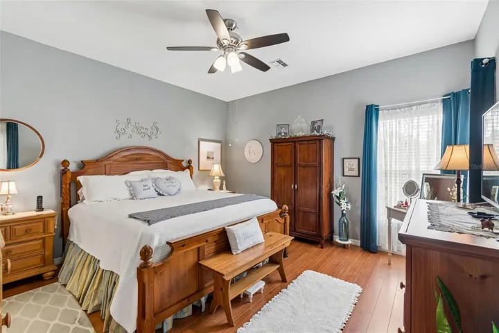 Large, bright master with real wood floors