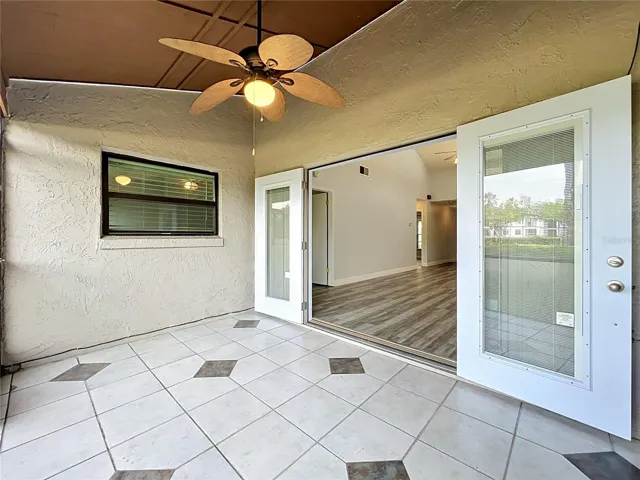French doors opened to living area.