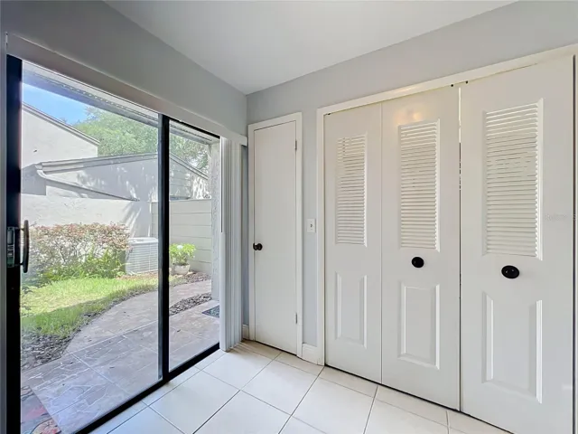 Laundry area, pantry and sliding doors in Kitchen
