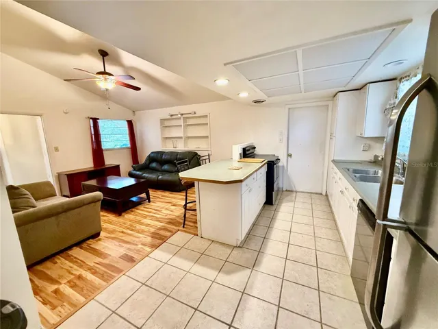 Breakfast counter and family room just off the kitchen.