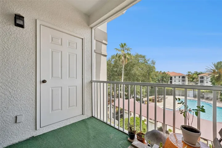 Exterior Storage closet and beautiful turfed patio area