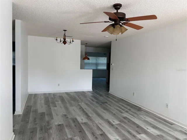 Living and dining room looking toward kitchen