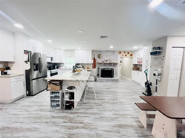 VIEW OF KITCHEN FROM ENTRANCE