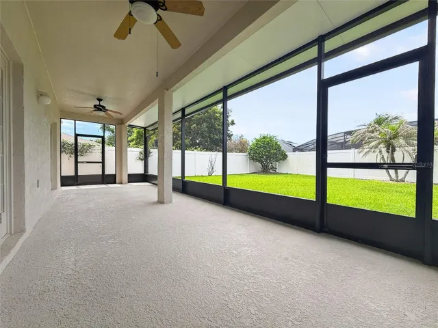 Wide Screened-in Porch with Ceiling Fans