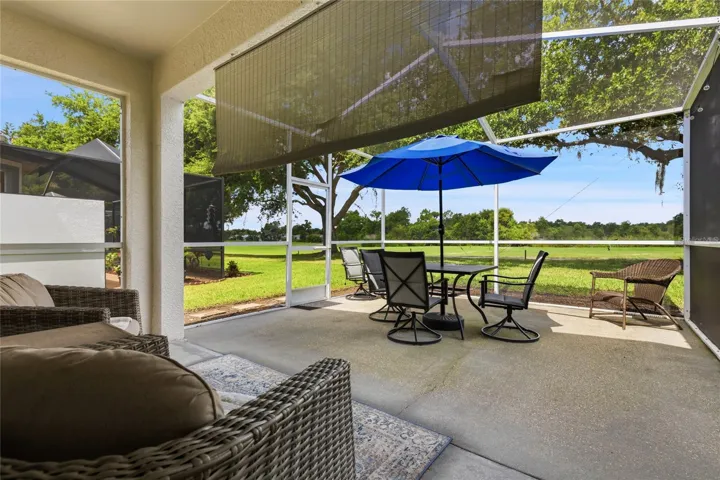 LARGE SCREENED PATIO/LANAI WITH VIEW OF GOLF COURSE