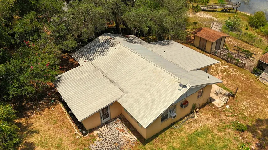 features a metal roof...