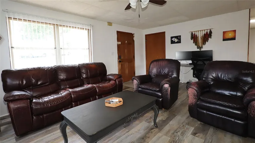 with spacious living room...