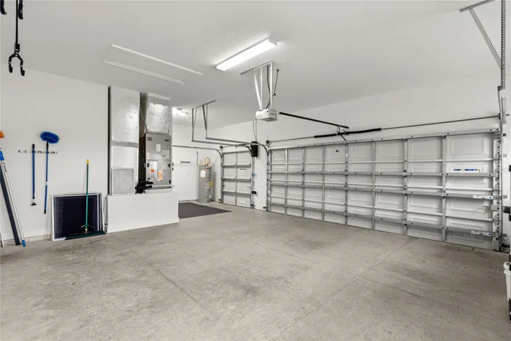 ...inside Garage features oversized 18 Foot Wide Garage Door!