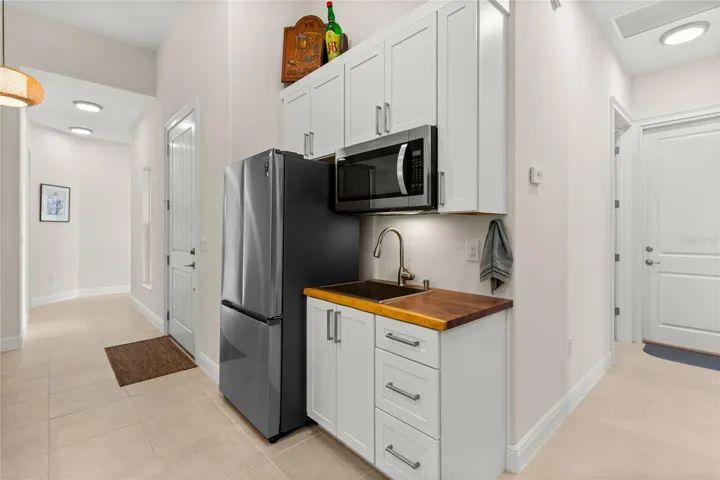 You will love this custom WET BAR with SECOND REFRIGERATOR!