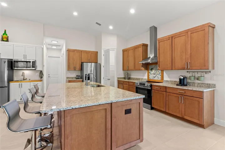 Lots of cabinets to include lighted walk in pantry!