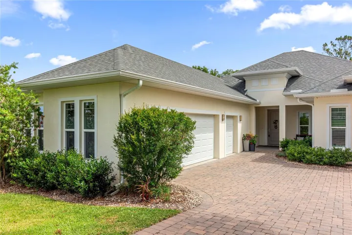 Upgraded Brick Paver driveway lead to 2 CAR PLUS GOLF CART GARAGE!