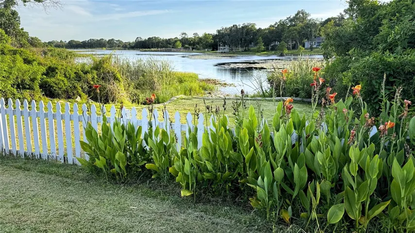 White picket fence and a lake view!
