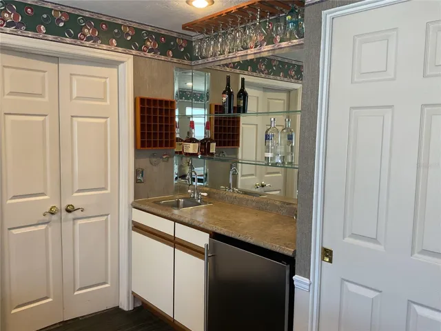 Wet Bar with refrigerator in family/game room - everything you need right at your fingertips