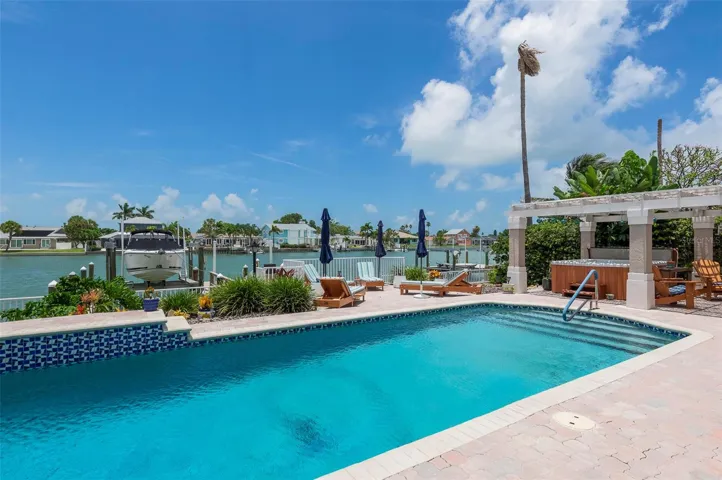 Saltwater pool overlooks the newer composite dock and the Bay