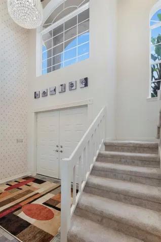 2-story front entryway with stairs to 2nd level master suite