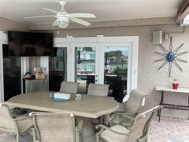 Covered back area great for outdoor dining - perfect for relaxing with family and entertaining friends