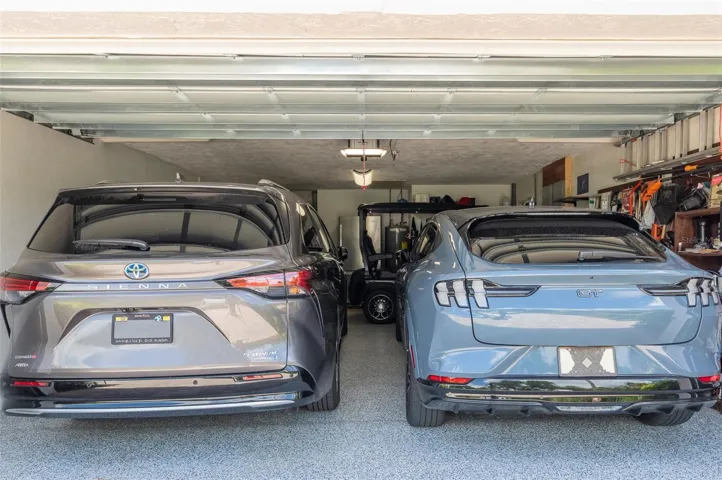 Garage fits 2 cars and a golf cart